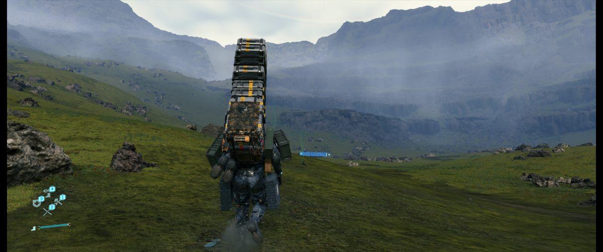 An ultrawide screenshot of Death Stranding's landscape.